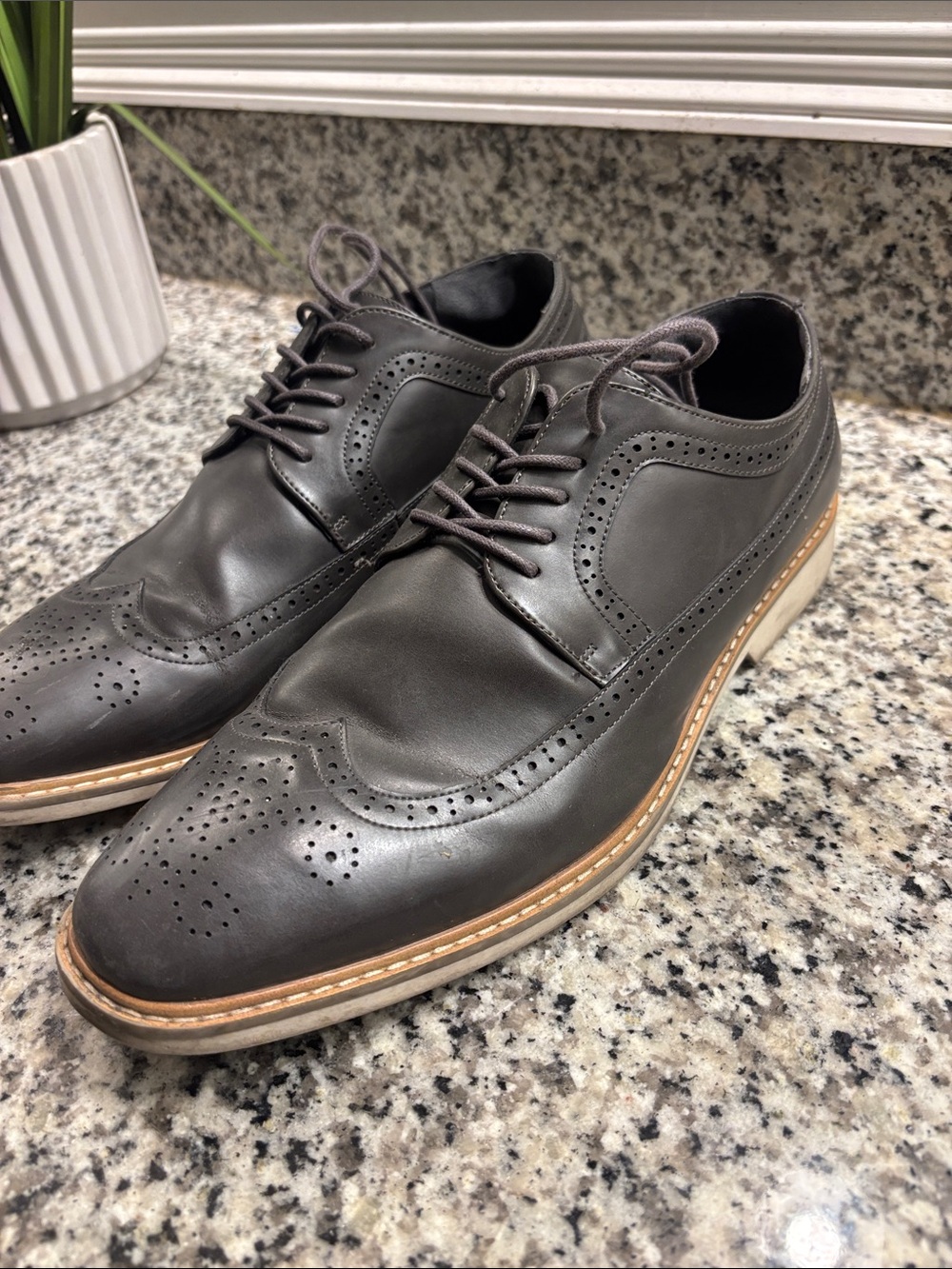Unlisted by Kenneth Cole Men's Black Leather Wingtip Oxfords with Tan Welt